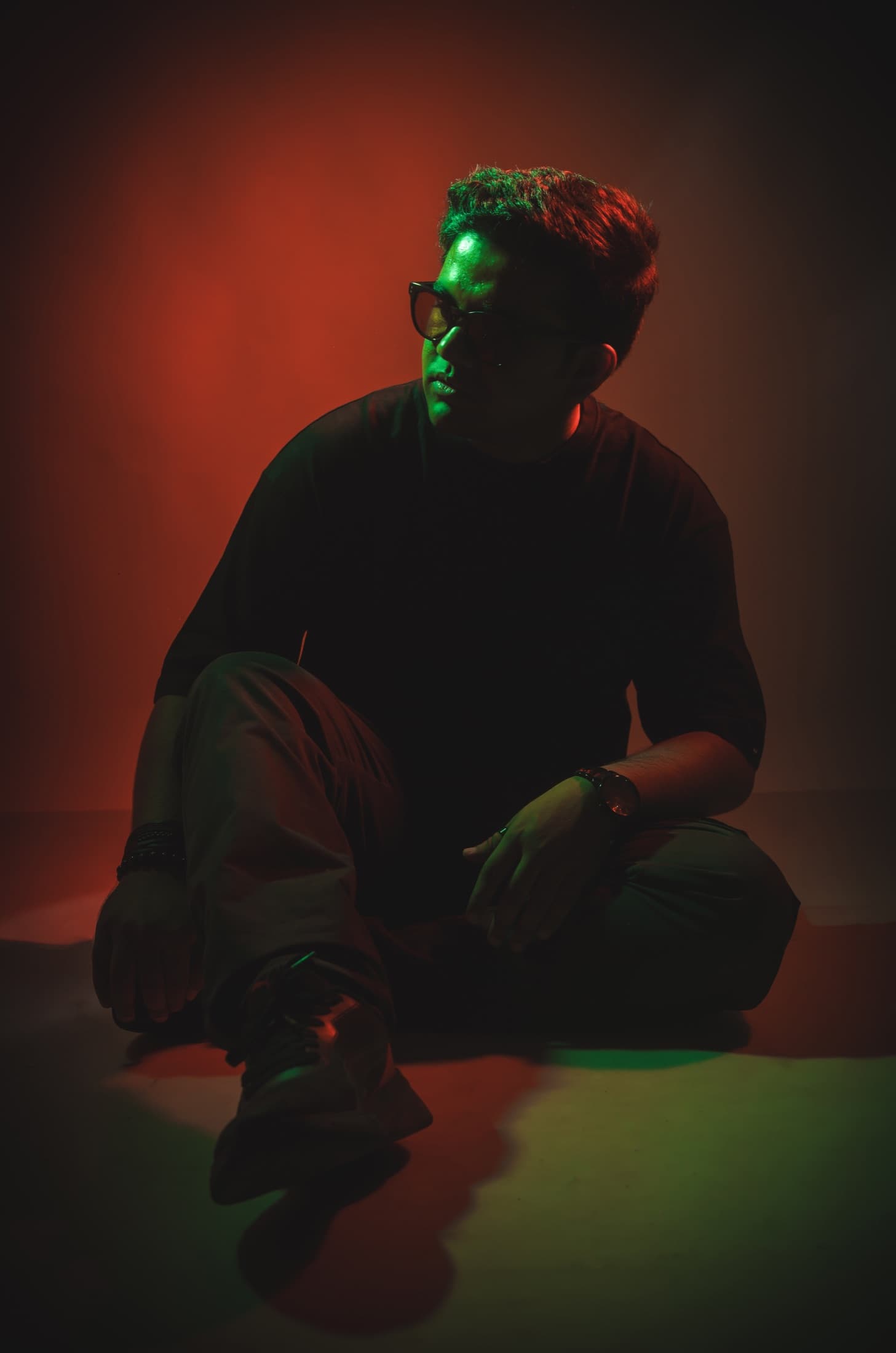 TRE crouched in red and green light